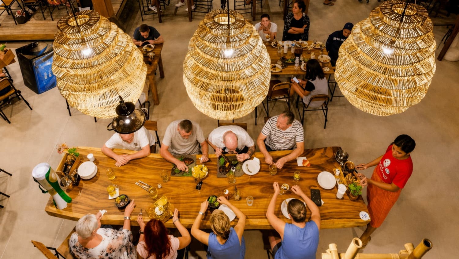 Long communal dining table set for service